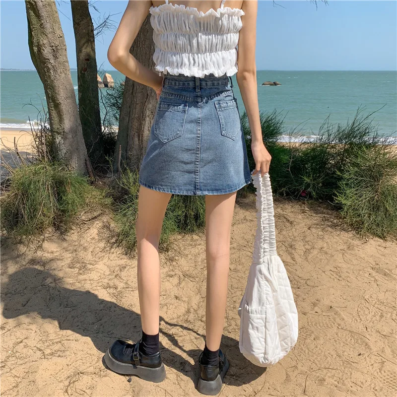 Dżinsowa spódniczka z wysokim stanem damska lato 2025 koreańska wersja designerska linia A wyszczuplająca i podkreślająca biodra krótka spódniczka damska