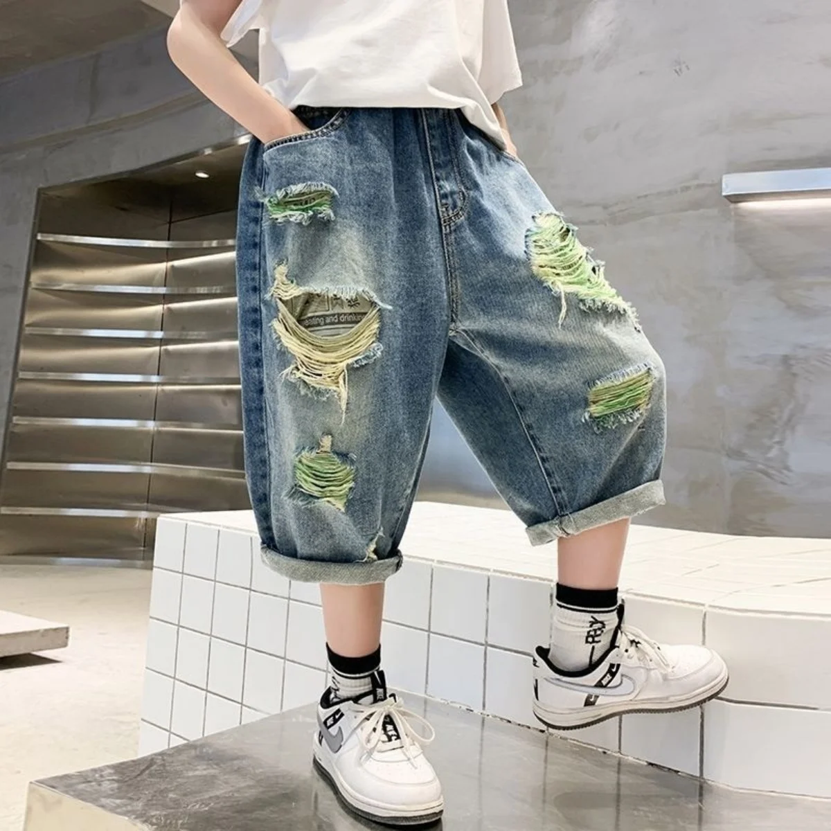 

2025 Children's Spring and Autumn New Jeans for Boys and Girls with Ripped Holes Soft and Comfortable Pants for Children Trendy