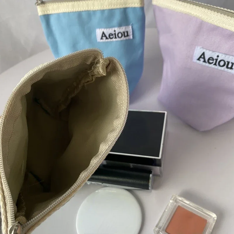 Mini bolsa cosmética de lona portátil para mulheres, embreagem monocromática, bolsa de maquiagem, absorventes higiênicos, batom e bolsa de