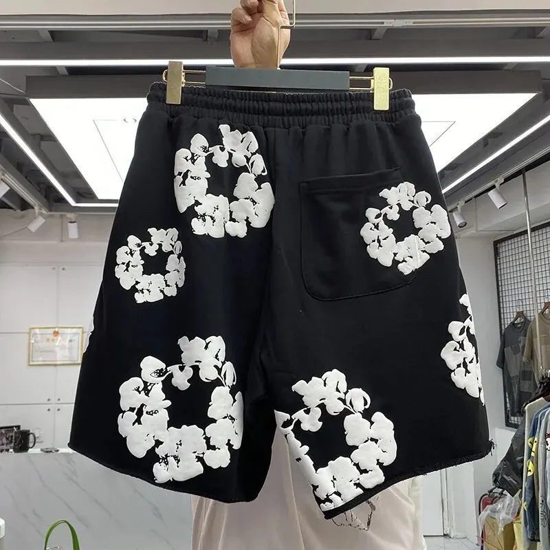 Beliebtes, modisches Kurzarm-T-Shirt mit Kapok-Schaumstoffdruck für Herren und Damen und Shorts-Set