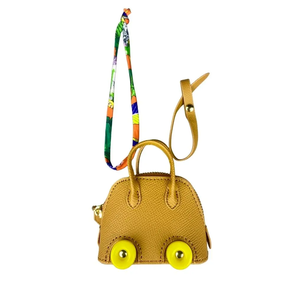 Mini-Taschenanhänger aus Leder mit niedlichen Rädern – Kopfhörer- und Lippenstiftbeutel mit zwei Riemen – PU-Leder – ideal für Taschenzubehör – Detail 14