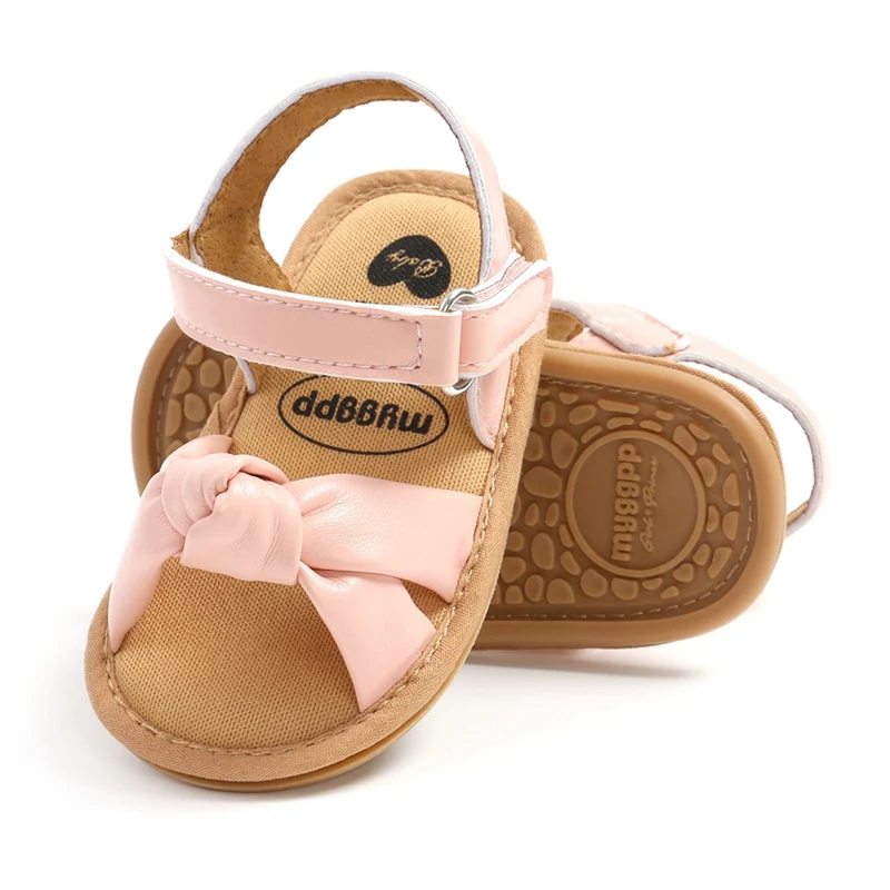 Pies felices: zapatos de suela de goma suave para caminar para niñas pequeñas con adorables detalles de lazo de PU (0-18 meses)