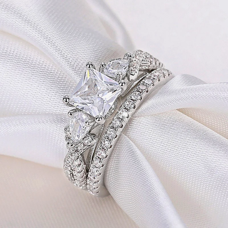 Huitan Luxus Prinzessin Zirkonia Set Ringe Frauen für die Hochzeit hochwertige Silber Farbe Ewigkeit Braut Ringe Modeschmuck