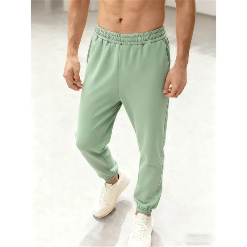 رجل الركض السراويل الرياضية الخريف الشتاء الصوف Sweatpants الرجال الرياضة الصالة الرياضية السراويل موضة بلون تجريب السراويل الطويلة غير رسمية
