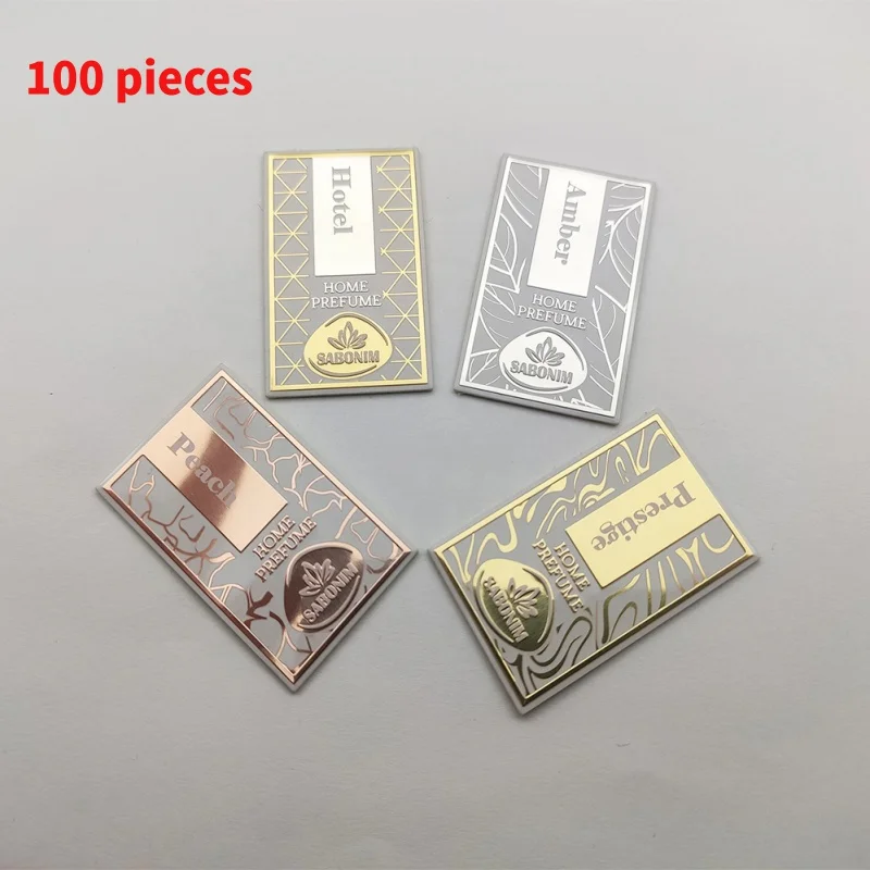 

10 0.Zhang.Custom.2023 Custom Designs Aluminum 3D Embossed Logo Labels Metal Sticker Fragrance Bottle Package Labe