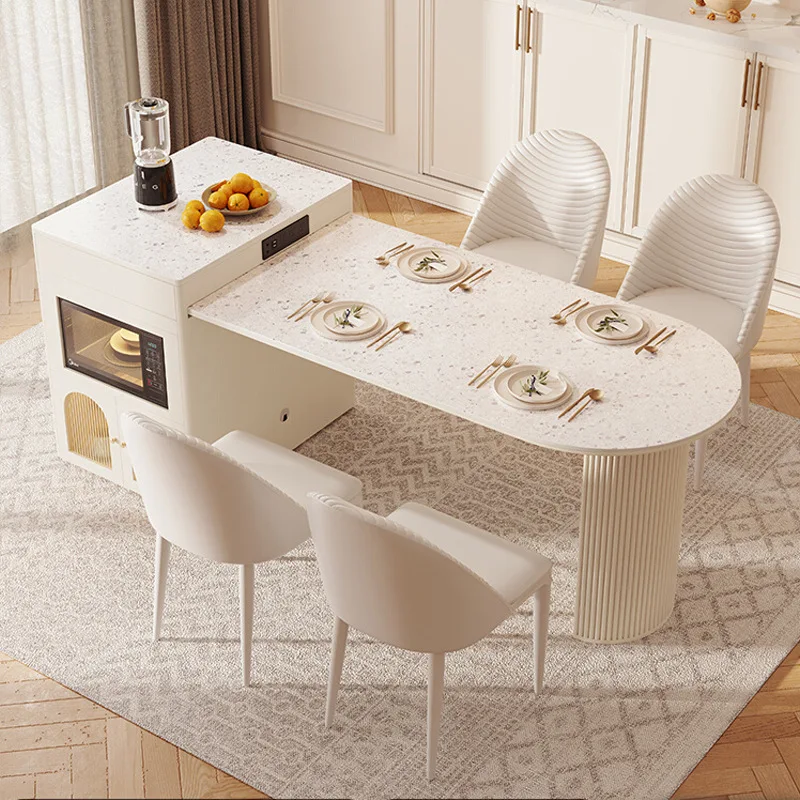 

Retractable island platform rock slab dining table integrated light luxury oval household dining table chairs cream style