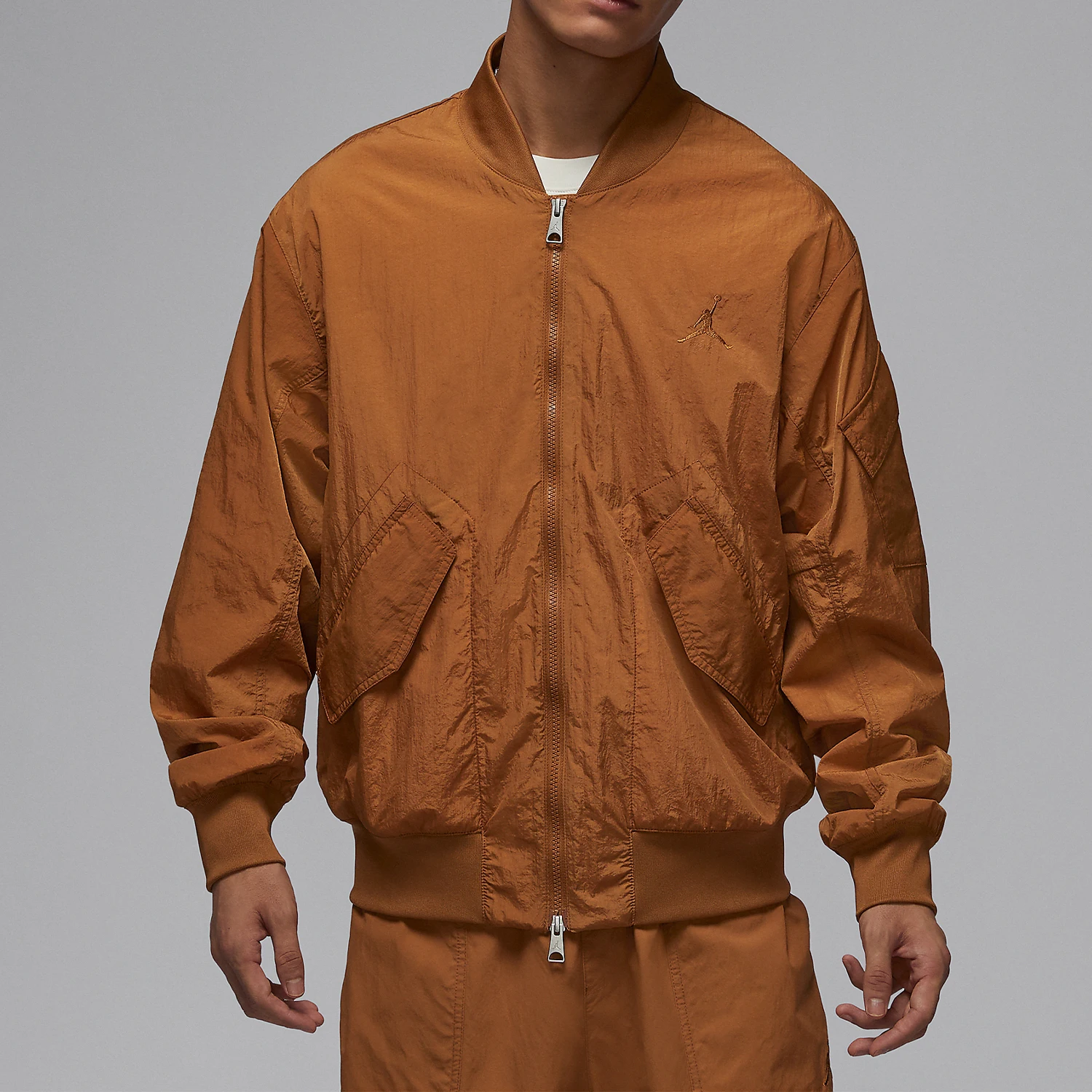 

Nike Official Authentic JORDAN Men's Water-Resistant Lightweight Woven Jacket FN4624-228