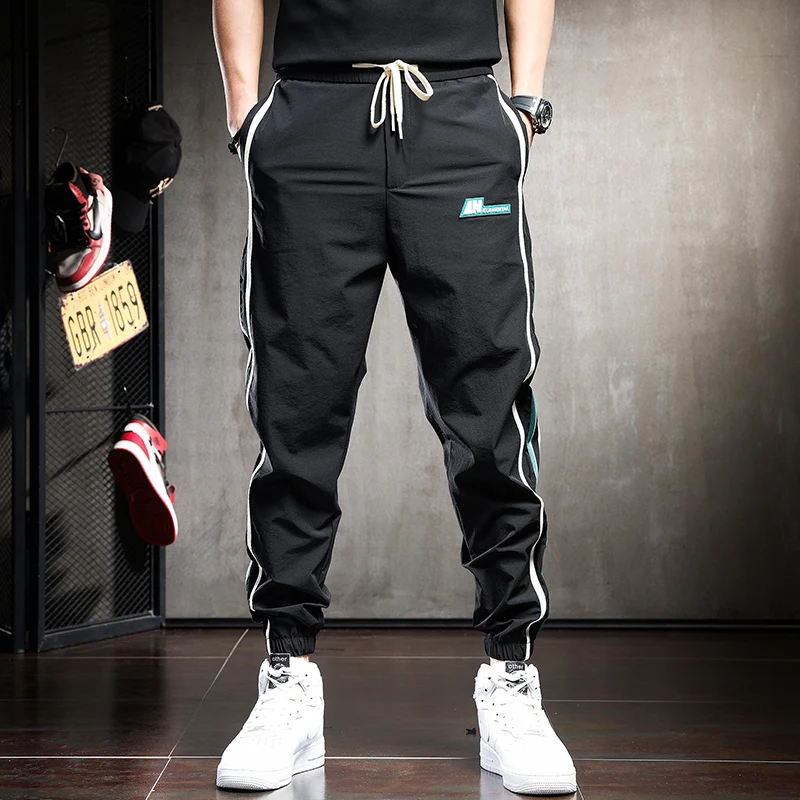 

Новые мужские повседневные брюки из ледяного шелка, тонкие свободные спортивные брюки с манжетами, модные универсальные весенне-летние брюки для отдыха