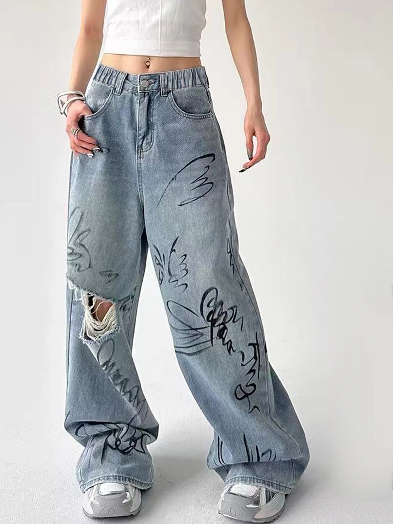

Teenage Boy's Fashionable Graffiti Long Wide Leg Jeans Casual Loose Straight Tube Pants for Preteens And Tweens