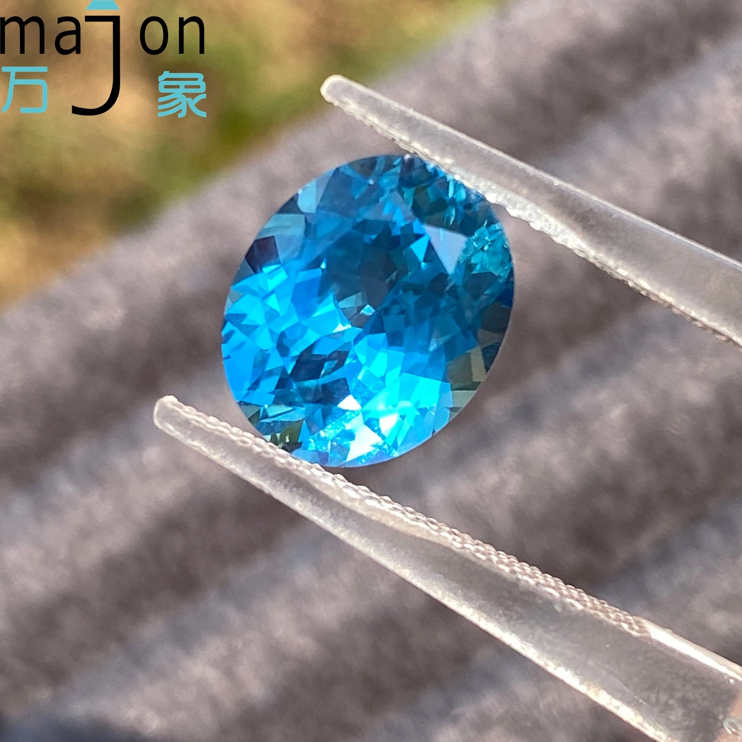 แซฟไฟร์เพาะเลี้ยงคุณภาพสูง 4.85 กะรัต ทรงรี สีพาราไอบา สำหรับทำจี้ เครื่องประดับขั้นสูง วัสดุทำเครื่องประดับ DIY