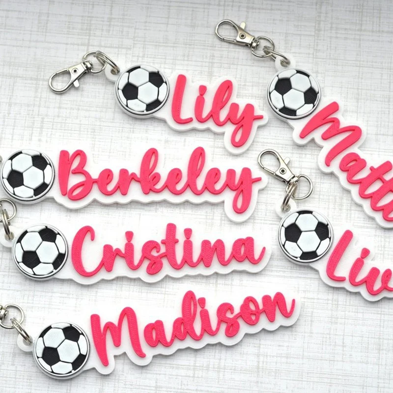 

Pink Color Custom Name Football Shape Acrylic Keychain in English Hebrew Couples Gift Personalized 3D Nameplate Backpack Keyring