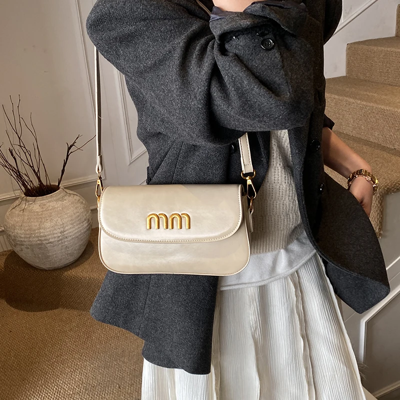 

Роскошная элитная минималистичная винтажная модная сумка с уникальным буквенным логотипом для женщин, повседневный стиль через плечо и большой вместительности