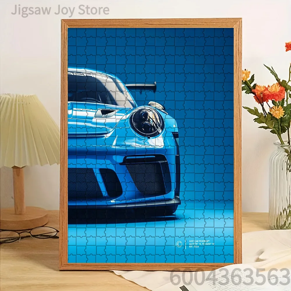 

Paper Jigsaw Puzzle Sleek Blue Sports Car Front View Artwork Monochromatic Blue Background Design Creative Home Wall Decor Inter