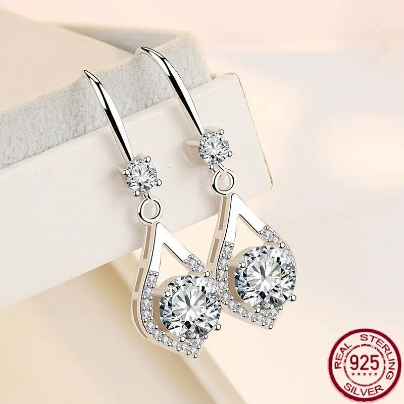

New S925 pure silver earrings, water drop peach heart pendant, high-end fashion moissanite earrings, wedding jewelry.