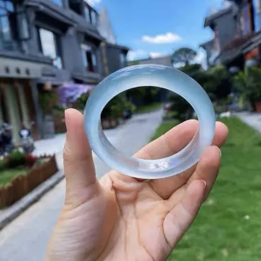 

Натуральный нефритовый браслет из жадеита цвета голубой воды, синий, как ледяное море, с драгоценными камнями, женская модель.