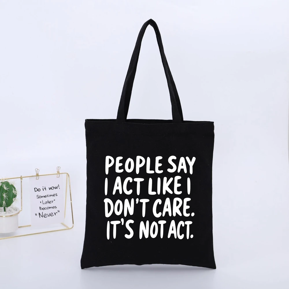 PEOPLE SAY I ACT LIKE I DON'T CARE. IT'S NOT ACT. Graphic Black Canvas Tote Bag, Urban Style for Daily Casual Use