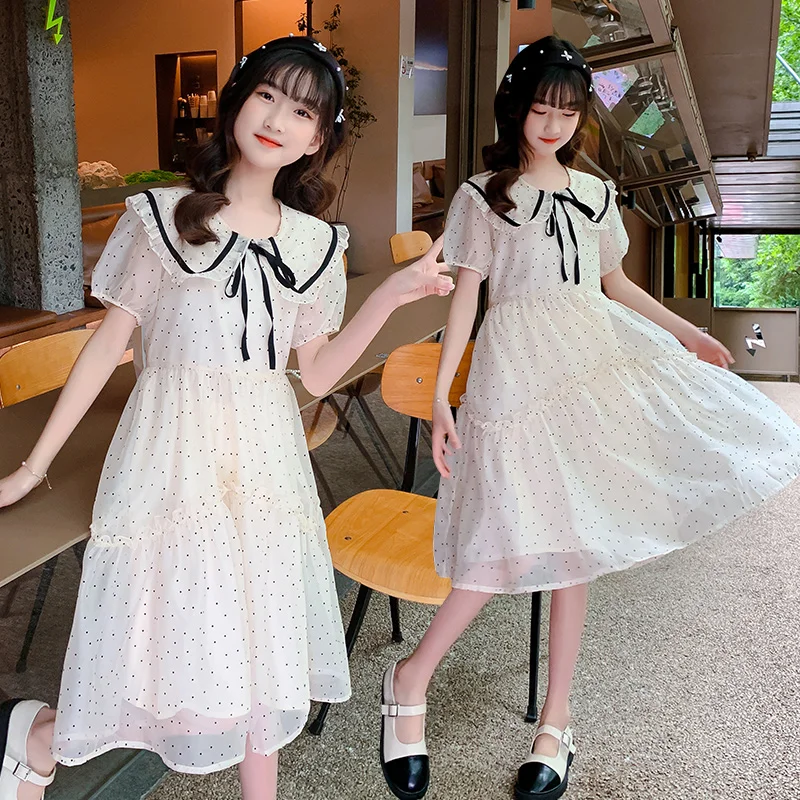 

Summer vacation girl seaside dress polka dot breathable princess skirt 2022 new children's short-sleeved long skirt cheap women