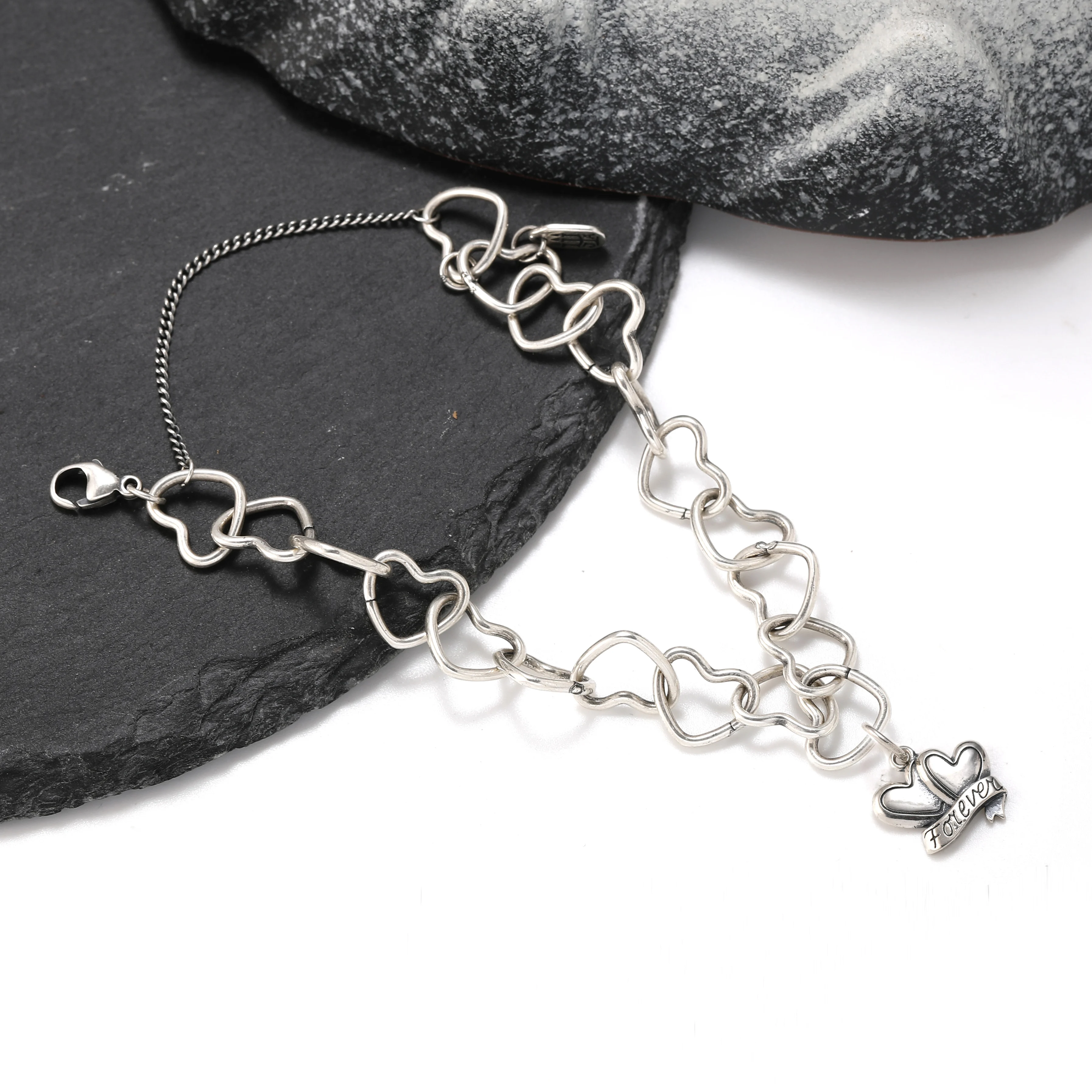 

Genuine 925 sterling silver Connected Hearts Charm Bracelet paired with the "Eternal" love pendant
