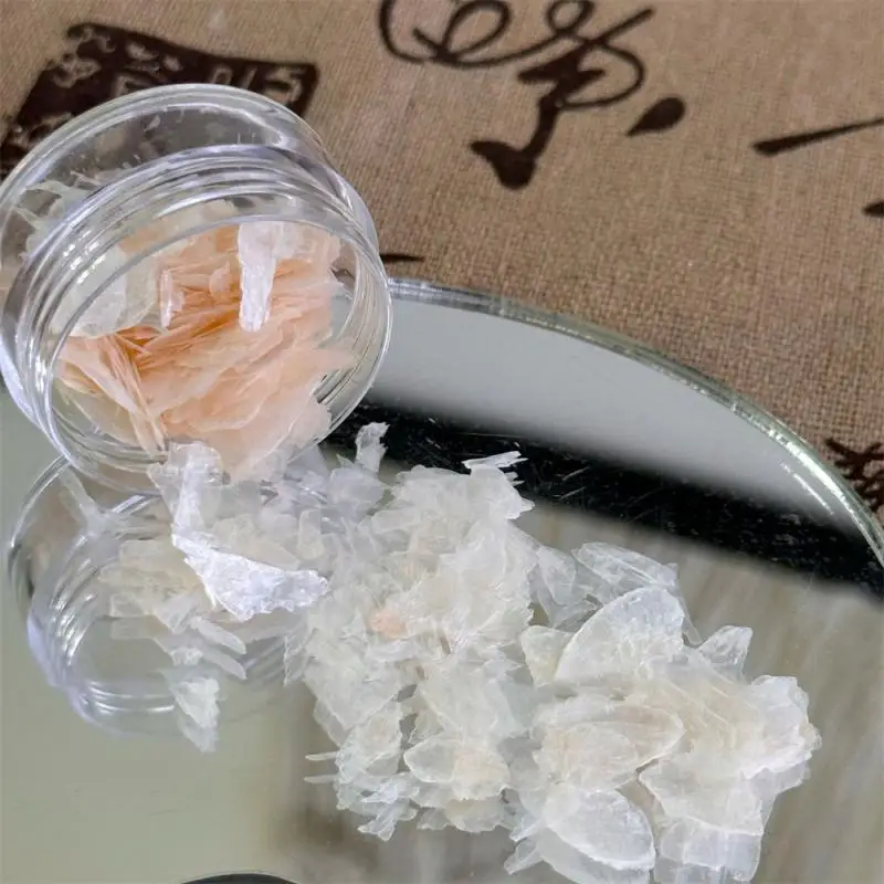 Akcesoria do paznokci do Manicure noszą naszywki do paznokci z nieregularnymi, ultracienkimi, fantomowymi płatkami w kolorze zdrowia i urody