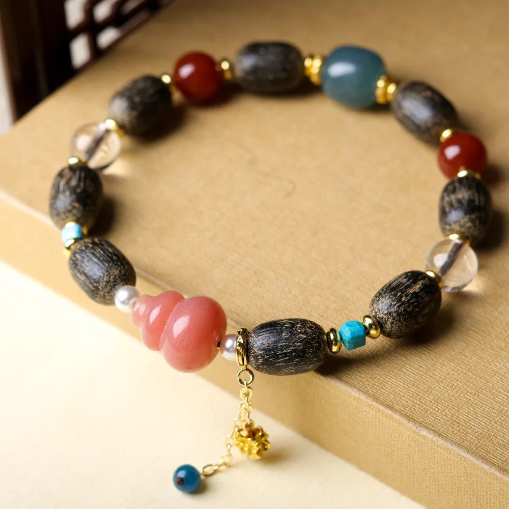 

Natural Agarwood Bracelet with White Crystal Bodhi Root Gourd Decorative Beaded Bracelet Gifts