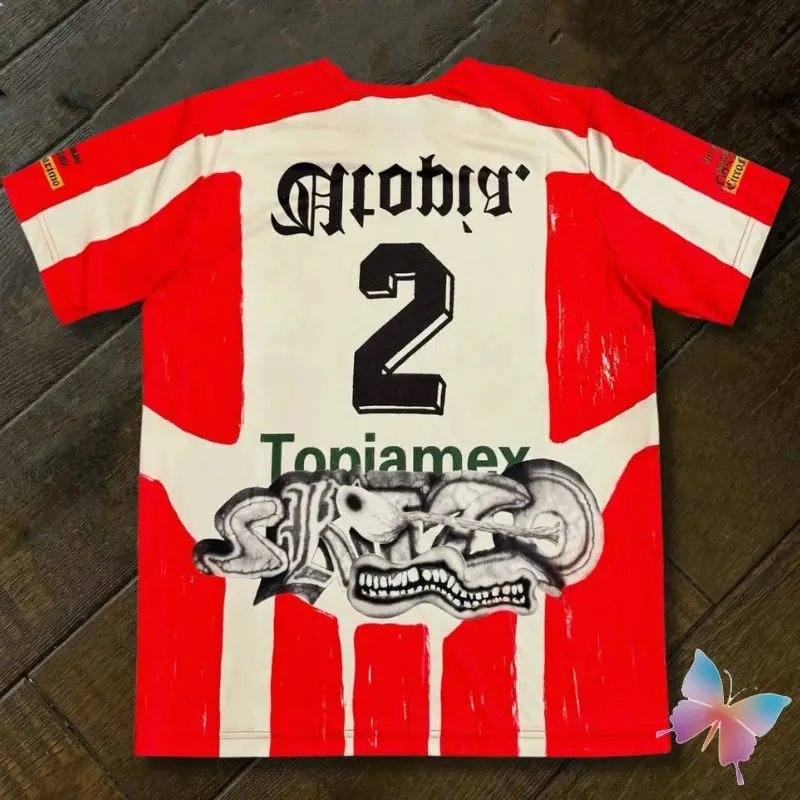 กีฬาแห้งเร็ว UTOPIA Jersey แคคตัสแจ็คแขนสั้นสีแดงสีขาวลาย Graffiti ฟันพิมพ์เบอร์ 2 Jersey ผู้ชายผู้หญิงเสื้อยืด