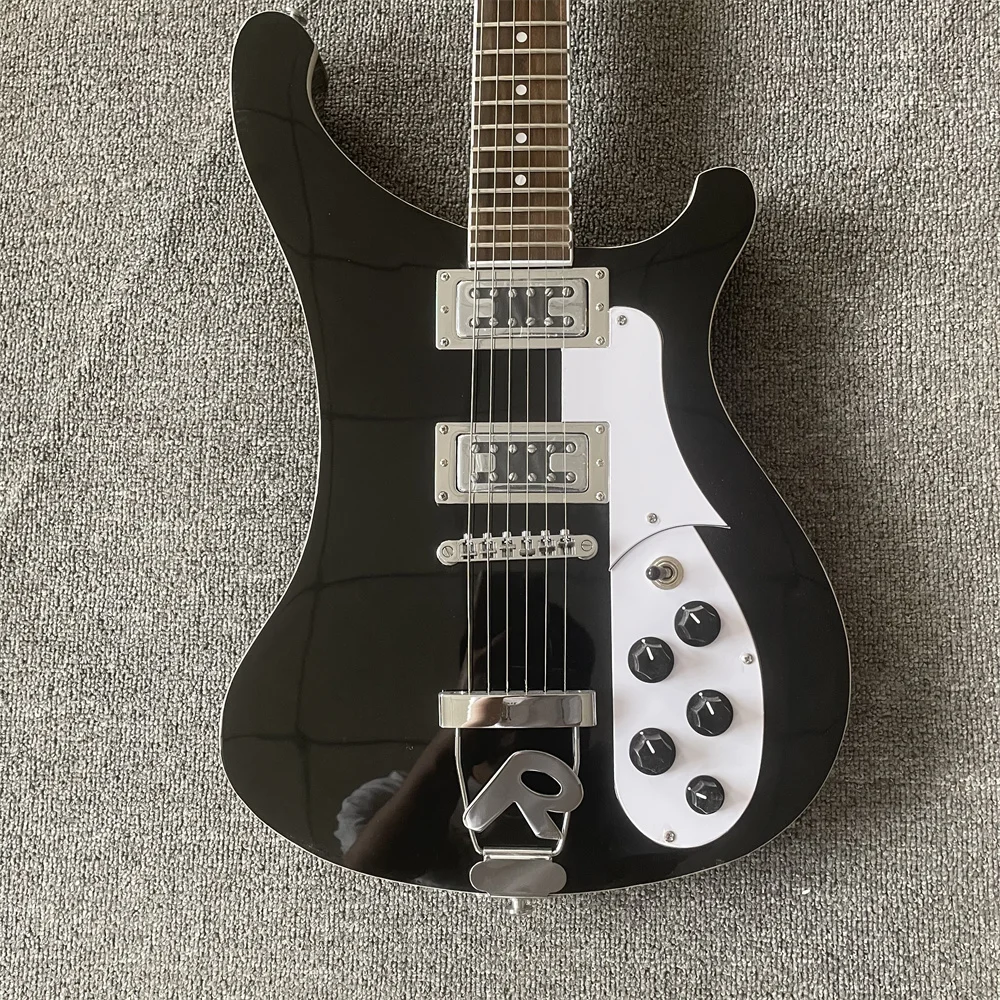 

In stock The 6-string Riker electric bass is black body with silver accessories all over guitars guitarra