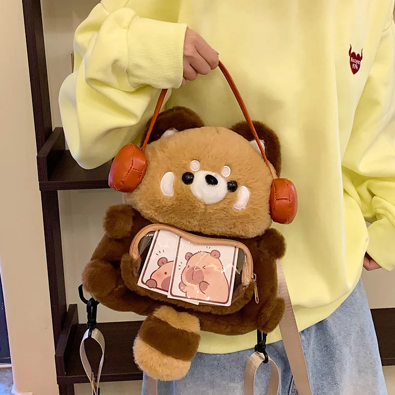 2026 Spring Cute Cartoon Earphones Little Raccoon Doll Plush Backpack Soft Cute Versatile Commuter JK Backpack Trend