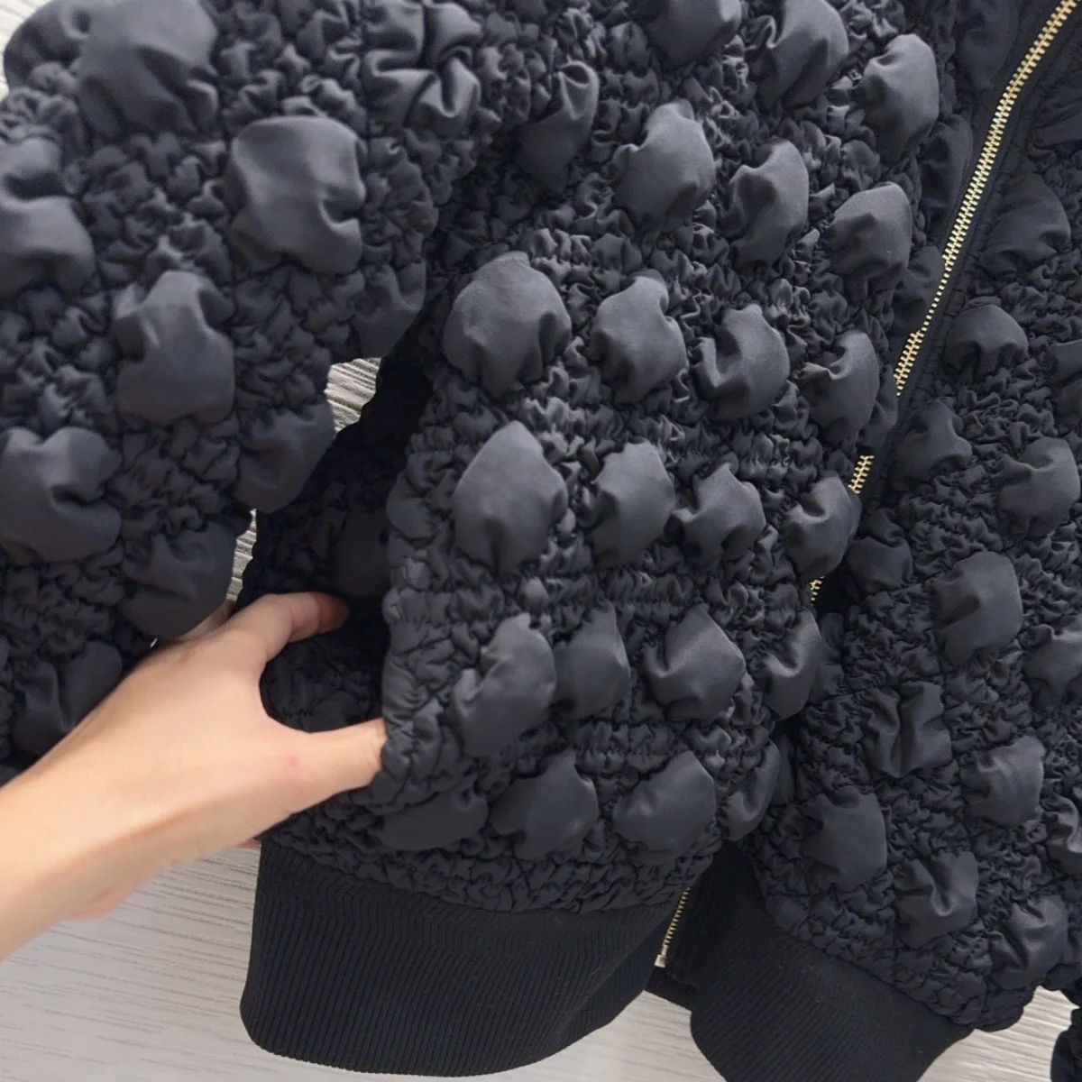 2026 high-quality women's clothing niche design sense three-dimensional bubble grid short cotton clothing26101611