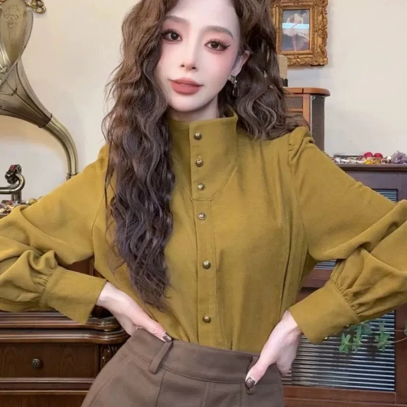 20224 香港スタイルのレトロな気質スタンドアップカラー秋の新スタイル長袖シャツデザインフレンチトップ女性服