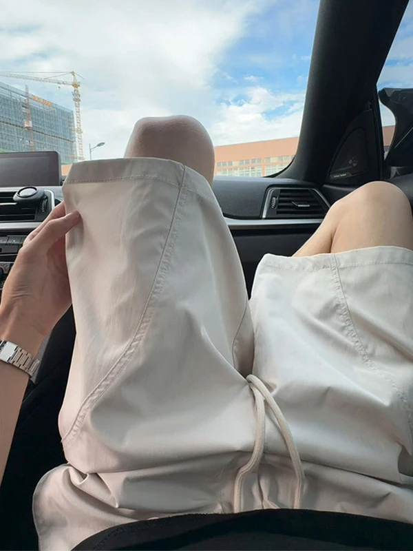 

Легкие спортивные мужские шорты бежевого цвета с боковыми вырезами, быстросохнущие, для пляжа, свободного прямого кроя, длиной до колена