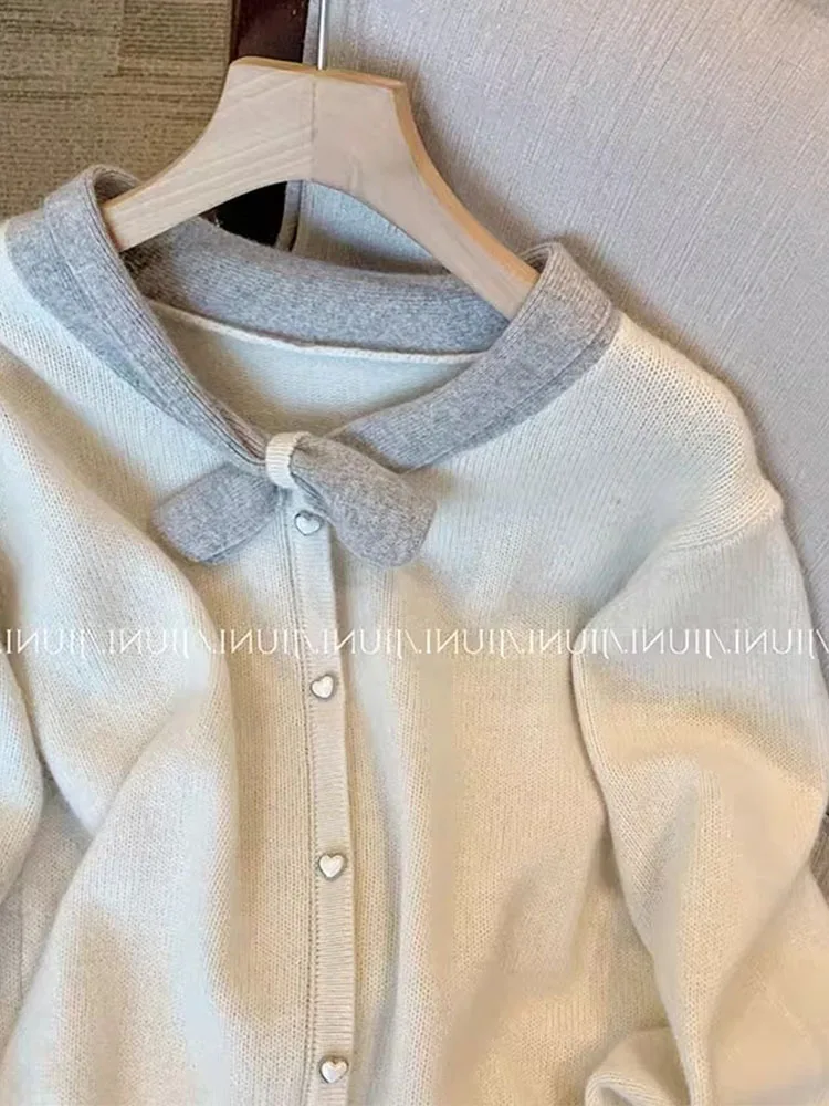 Maglione lavorato a maglia di lusso di moda di alta qualità Vintage con scollo a v manica lunga pullover bianchi Office Lady Chic autunno inverno