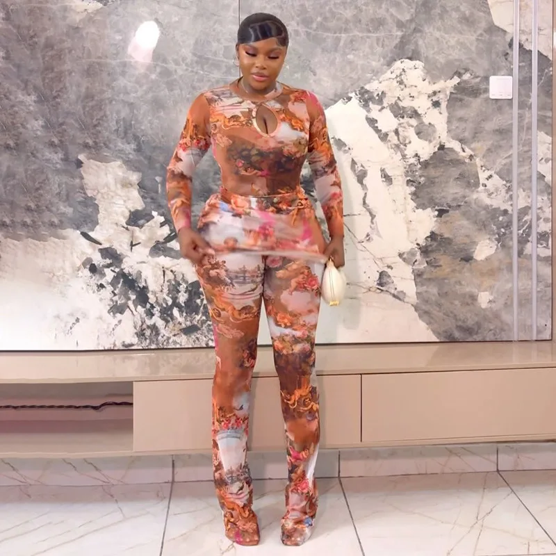 

See Through Mesh Printed Slim Flare Jumpsuits Women Sexy Hollow Out O Neck Long Sleeve Peach Hips Boot Cut Slim Club Overalls