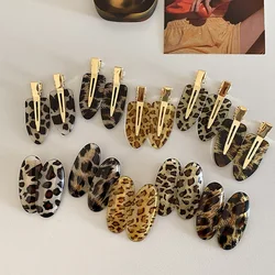 Korean version of retro fashionable leopard print seamless oval hairpin personalized versatile makeup edge clip hair accessories