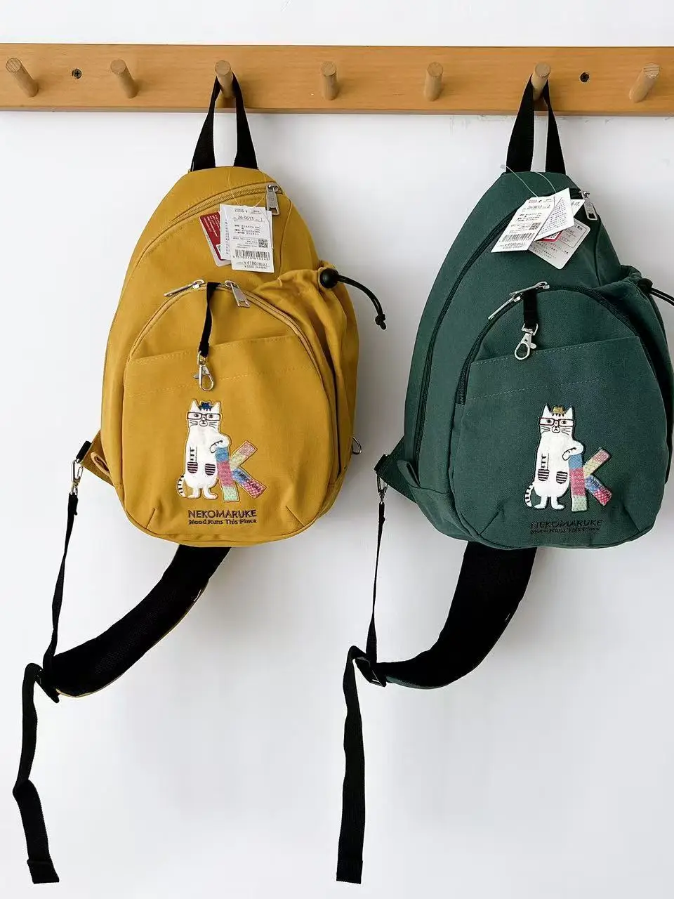 kusuguru-embroidered-eyeglass-chest-bag-portable-casual-travel-backpack-canvas-single-shoulder-bag-for-leisure-activities