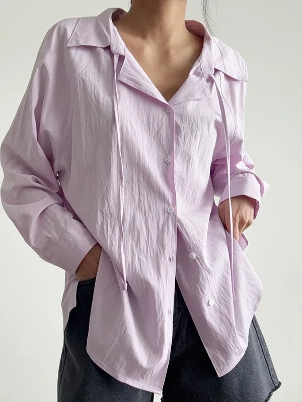 シックな春アンチエイジング長袖ルーズフィット女性のシャツリボンデザインピュアカラー多用途シングルボタンターンダウンカラー
