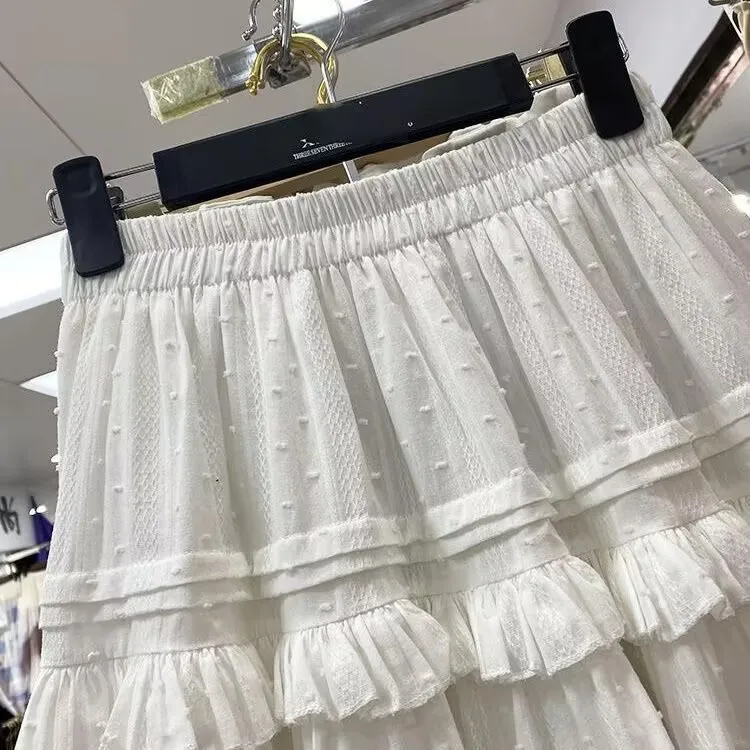 لوليتا التنانير الصغيرة للنساء Kawaii تنورة عالية الخصر ألف خط الكشكشة القوطية الصلبة بسيطة مطوي تنورة Y2k Harajuku تنورة بيضاء
