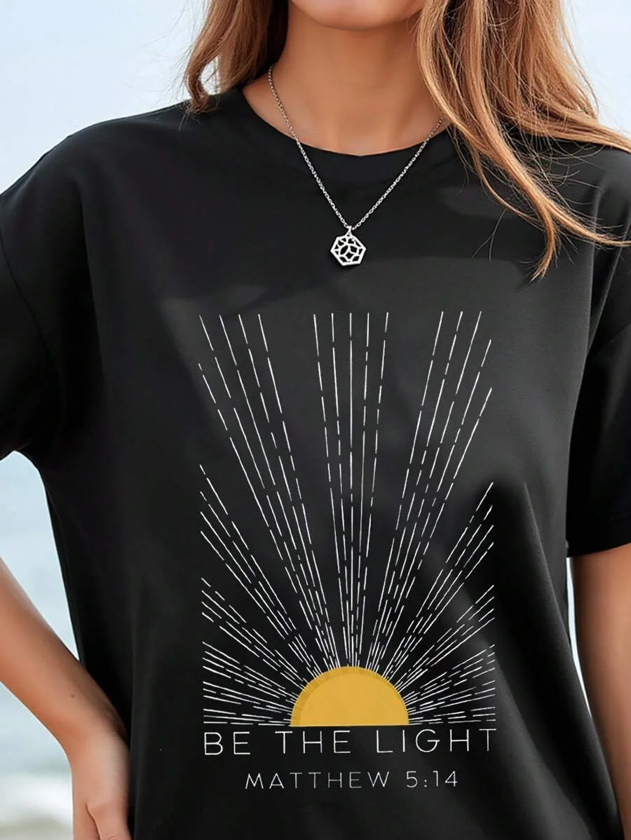 

Plus - Size Religious “Be The Light” Tee, Short - Sleeve with Bible Verse & Sunburst Pattern