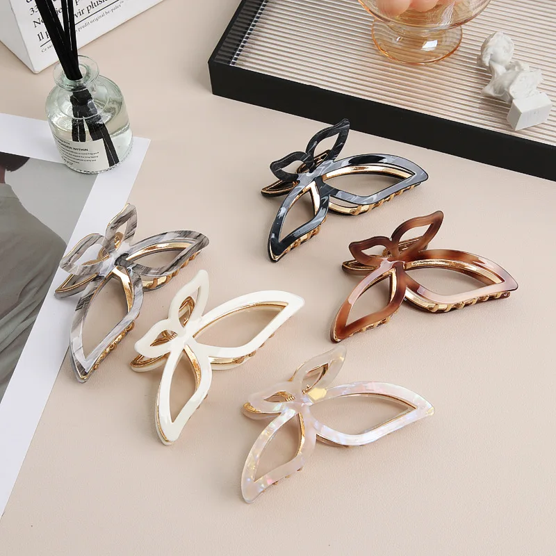 ユニークで繊細な中空蝶メタル爪ヘアクリップ、お団子ヘアホルダー、トレンディなサイドバングス、滑り止め、エレガントな女性用ヘアアクセサリー