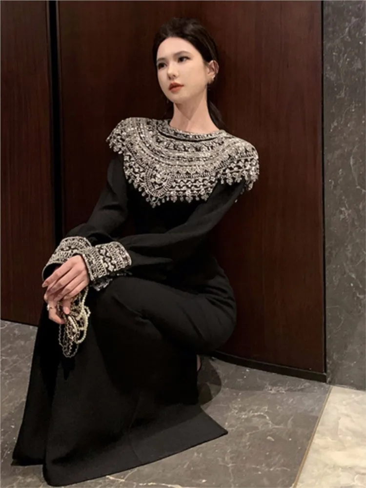 A black dress with unique and distinctive ethnic style