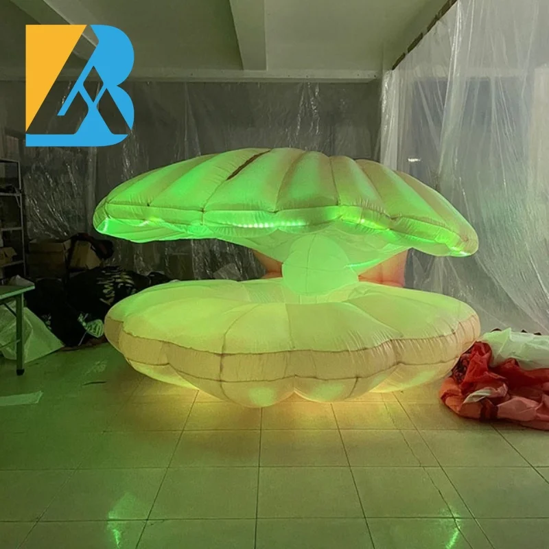 La grande festa a tema Royal Ball personalizzata illumina il guscio gonfiabile del mare per i giocattoli decorativi dell'ingresso sul palco