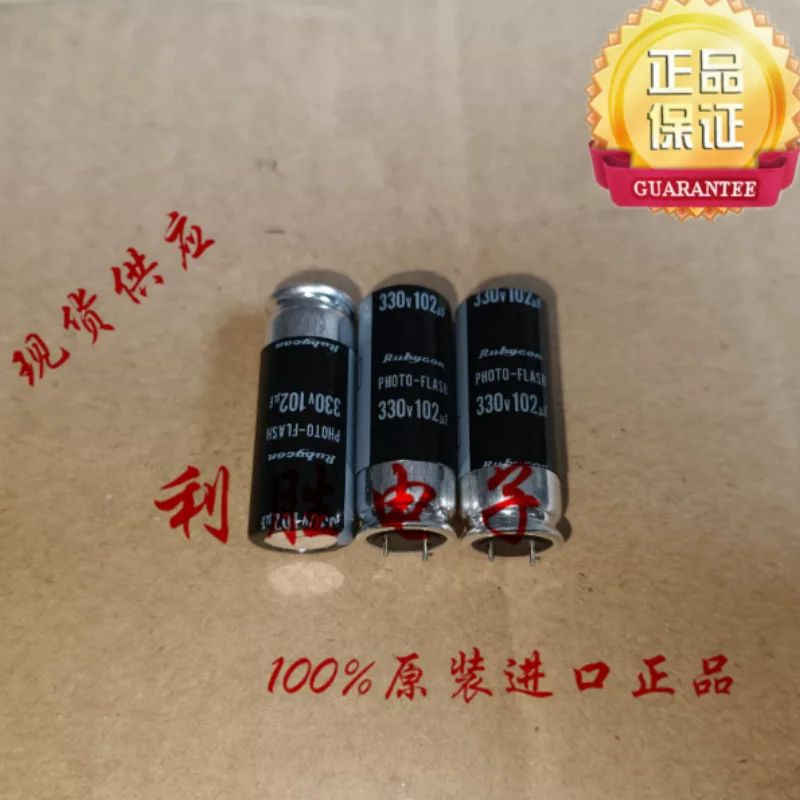 10PCS-100PCS Japanese Ruby Flash Capacitor 330V102UF 11 * 30 Short Pin Replacement 330V100UF