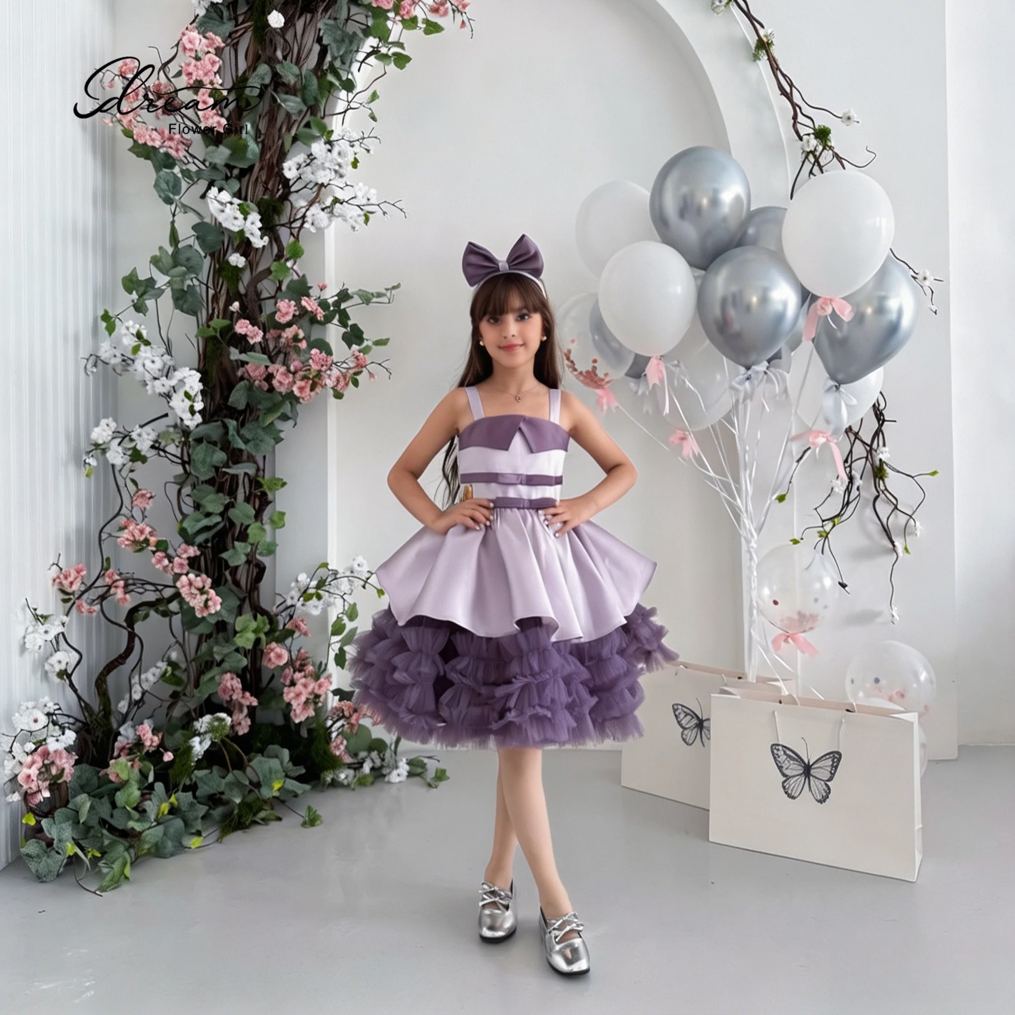 Classic purple women's formal bandeau and knee-length party dress, featuring a fluffy skirt and open-back design.