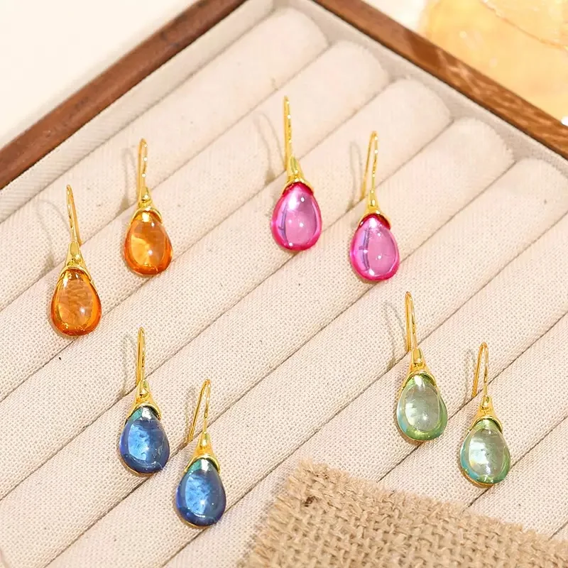Cross-border bestseller: trendy minimalist gemstone earrings with teardrop-shaped cat's eye stone, available in four colors
