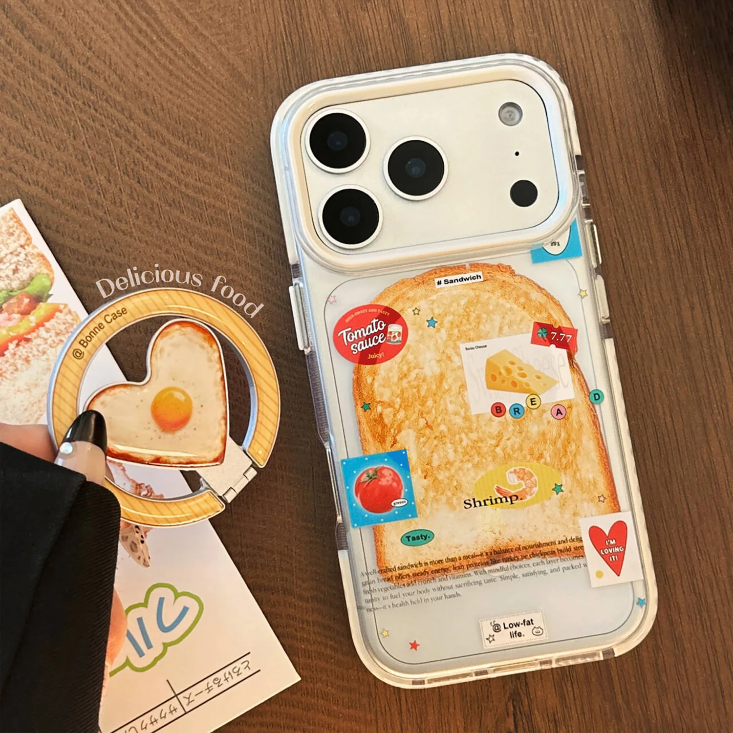 Koreanisches Toast-Muster mit Spiegelei, Liebesherz-Halterung, magnetische Handyhülle für iPhone 17, 16, 15, 14, 13, 12, Pro Max, stoßfeste Abdeckung