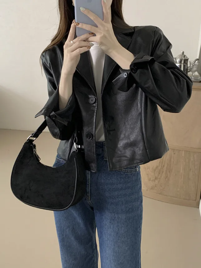 レトロな秋の女性用バイクスタイル長袖スーツカラーフェイクレザージャケットルーズフィット万能ショートコートアウター