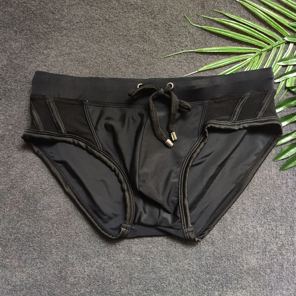 2026Classic style black triangular side mesh splicing triangular swimming pants cross-border American racing shorts UXH050