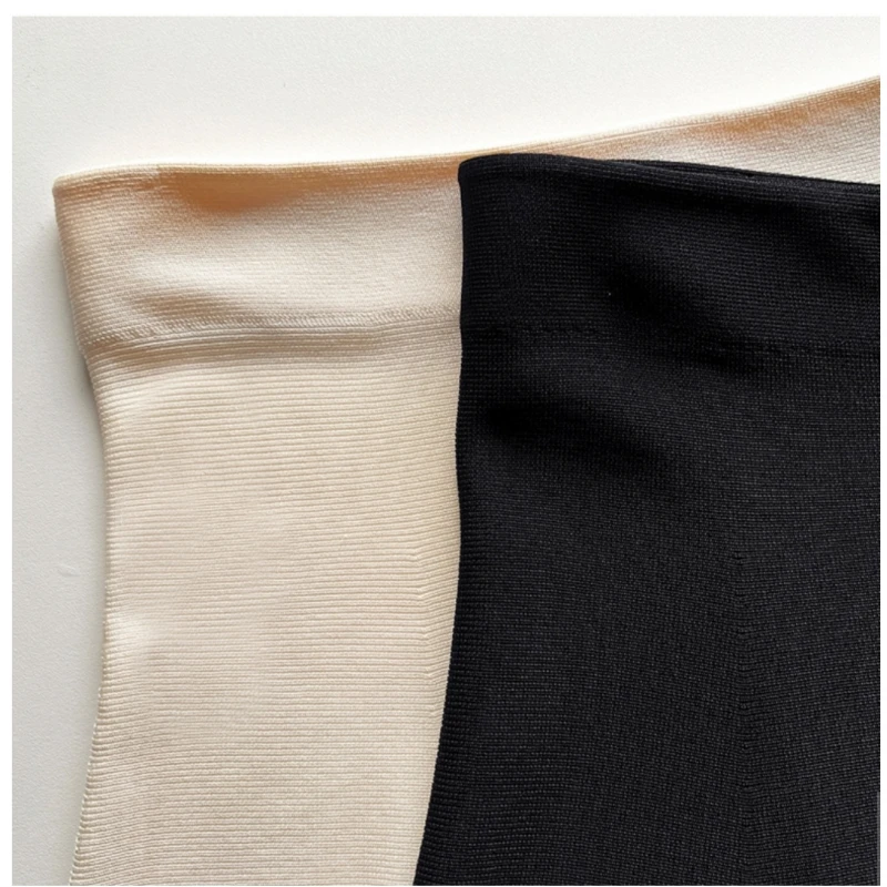 Simples, moderno e cheio de temperamento feminino de malha de cintura alta, meia saia fina, média a longa e versátil