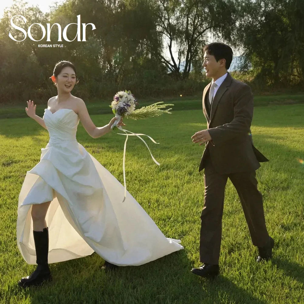 

Sondr Grassland Theme Korean Wedding Dresses Photo Shoot Customized Strapless Elegant Self-Wedding Gown for Bride 2026
