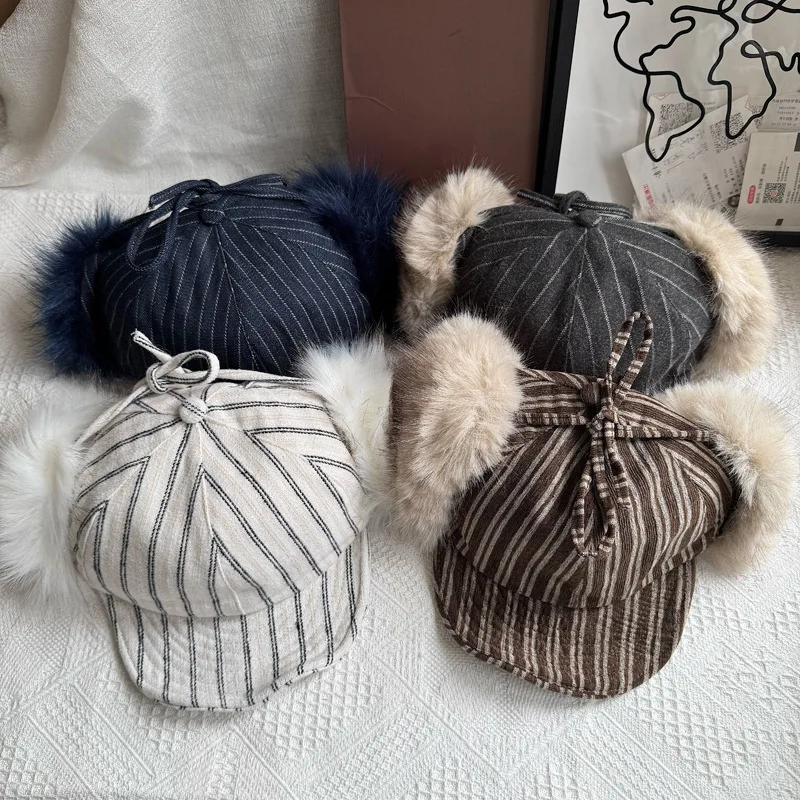 Korean- striped corduroy earflap women, perfect for autumn and winter. This warm, retro-style hat adds a touch of s