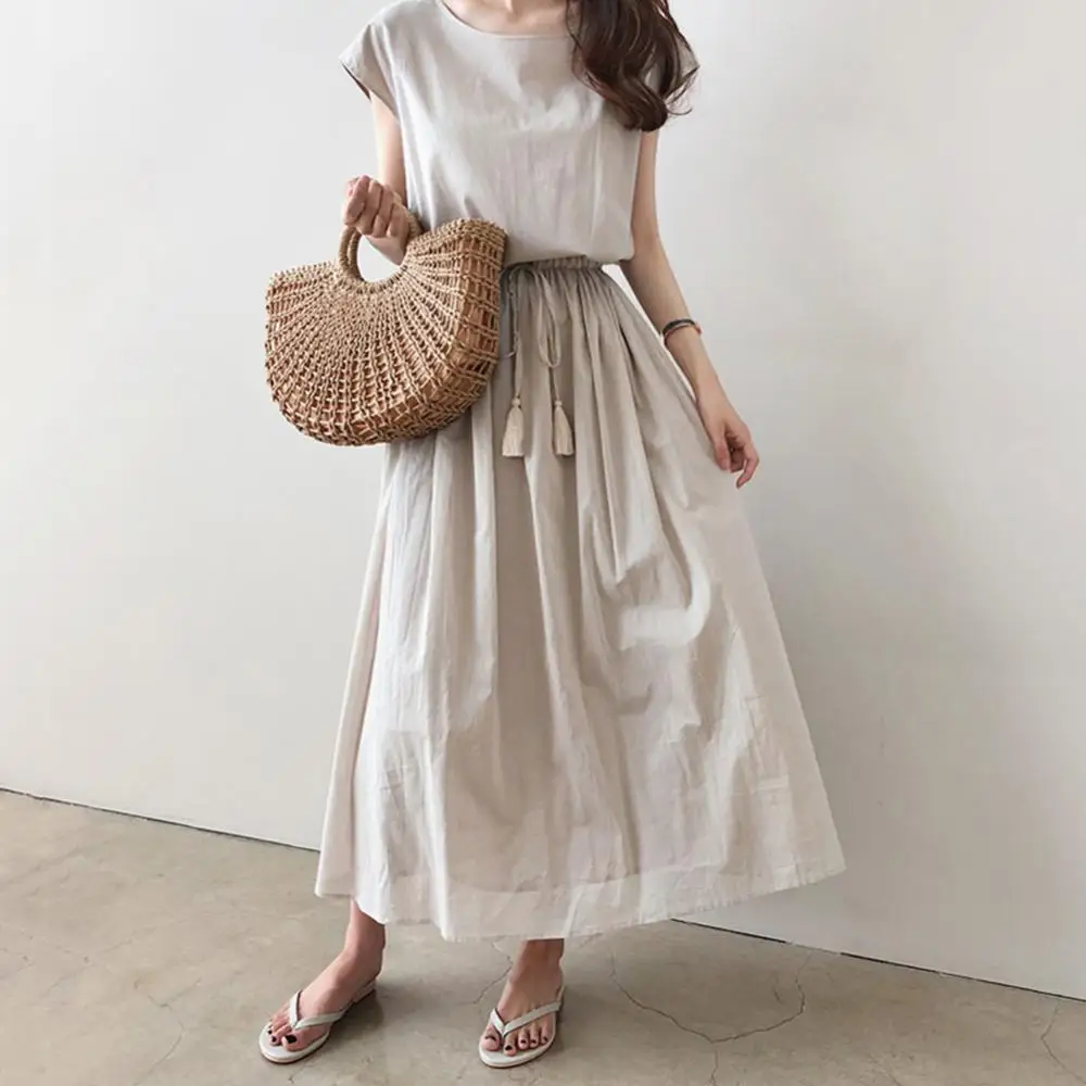 

Elegant and fashionable women's cotton and linen dress, round neck printed short sleeved A-line skirt, unique floral long skirt